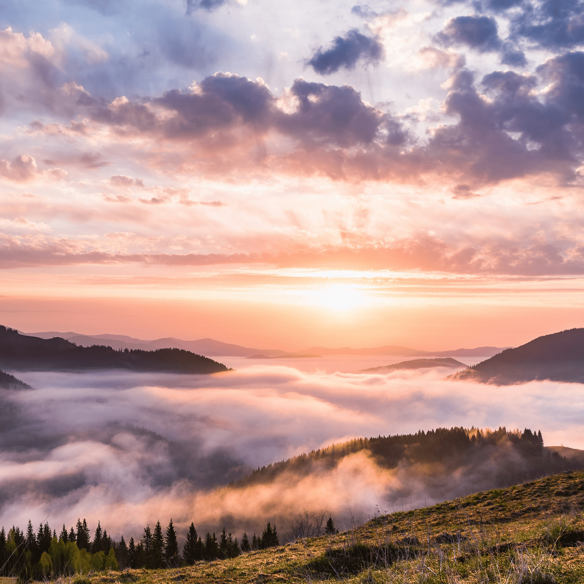 sunrise over mountains.